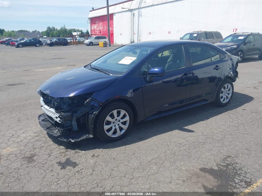 2026 Toyota Corolla VIN JTDB4MEE3T3040066 IAAI salvage auction — FRONT & REAR, Salvage (Oregon), sold $8,300 on 2026-07-30 (photo 2)