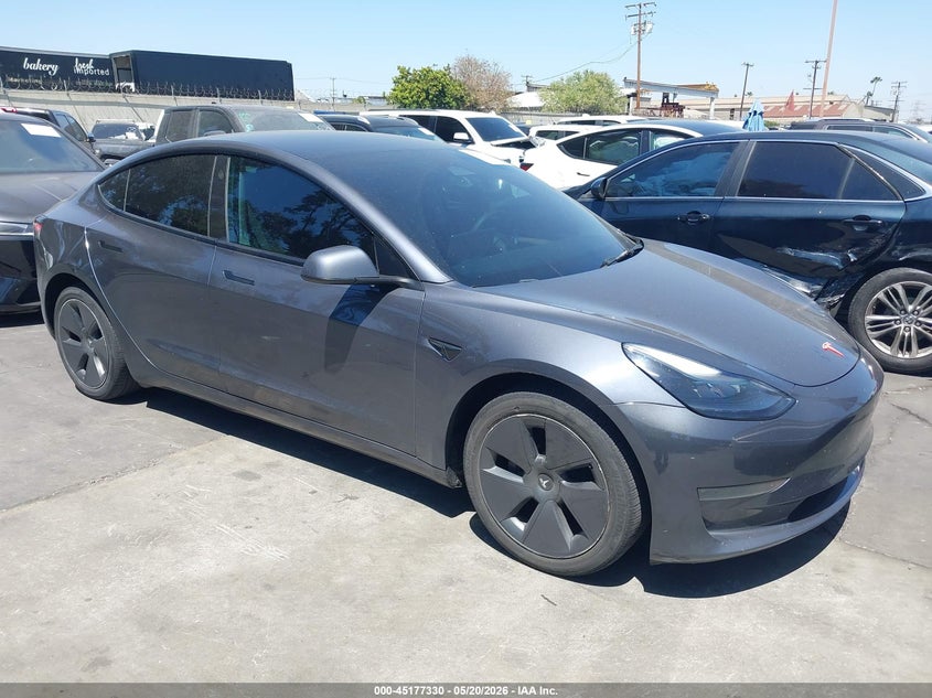 2023 Tesla Model 3 VIN 5YJ3E1EA8PF608687 IAAI salvage auction — REAR END, Salvage Title, sold $5,500 on 2026-08-30 (photo 1)