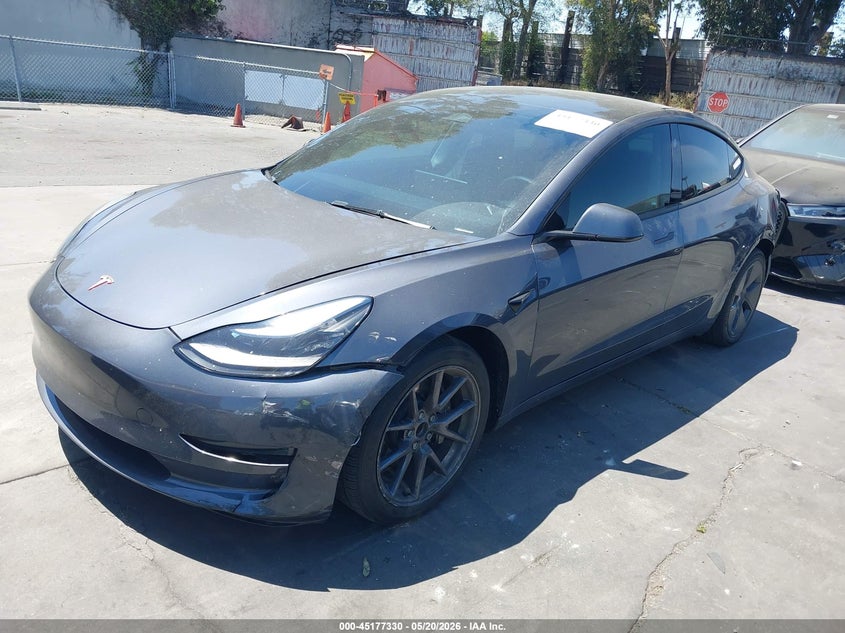 2023 Tesla Model 3 VIN 5YJ3E1EA8PF608687 IAAI salvage auction — REAR END, Salvage Title, sold $5,500 on 2026-08-30 (photo 2)