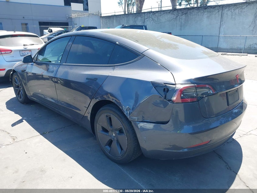 2023 Tesla Model 3 VIN 5YJ3E1EA8PF608687 IAAI salvage auction — REAR END, Salvage Title, sold $5,500 on 2026-08-30 (photo 3)