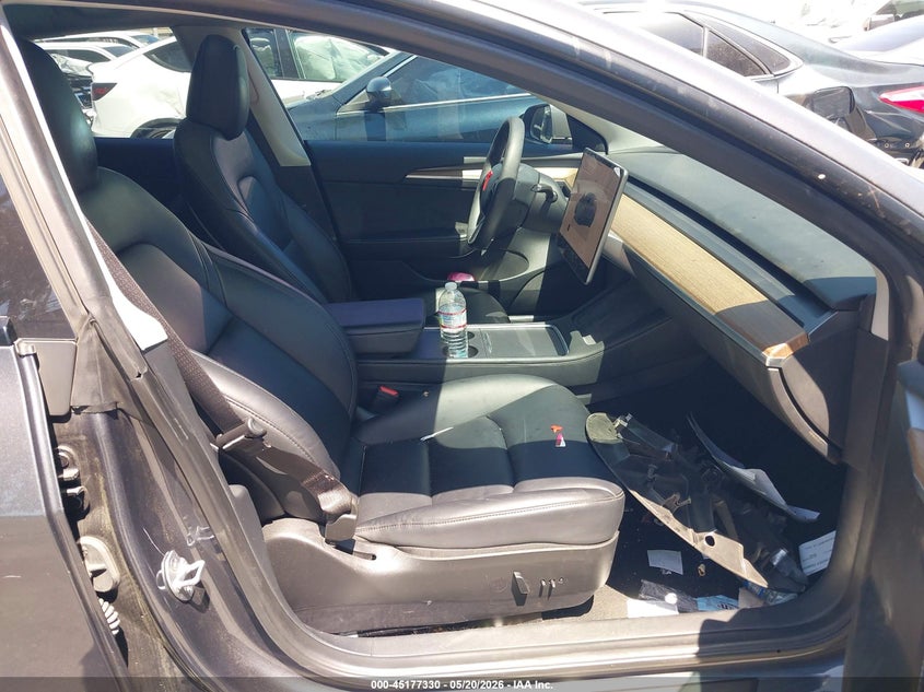 2023 Tesla Model 3 VIN 5YJ3E1EA8PF608687 IAAI salvage auction — REAR END, Salvage Title, sold $5,500 on 2026-08-30 (photo 5)