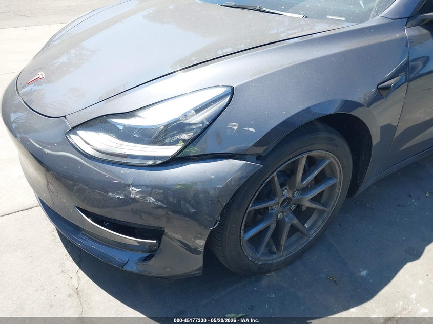 2023 Tesla Model 3 VIN 5YJ3E1EA8PF608687 IAAI salvage auction — REAR END, Salvage Title, sold $5,500 on 2026-08-30 (photo 6)