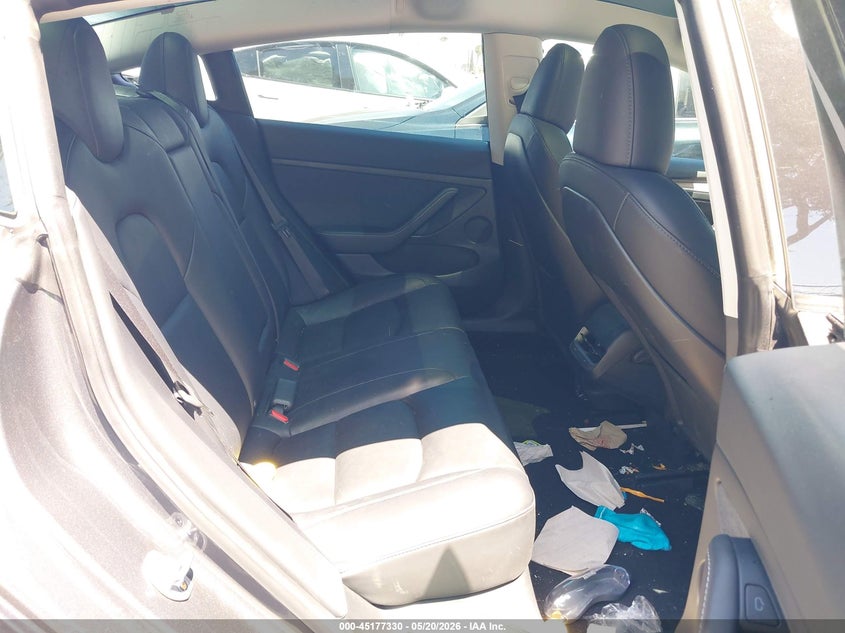 2023 Tesla Model 3 VIN 5YJ3E1EA8PF608687 IAAI salvage auction — REAR END, Salvage Title, sold $5,500 on 2026-08-30 (photo 8)