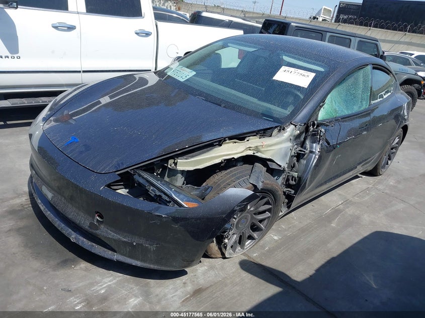 2025 Tesla Model 3 VIN 5YJ3E1EA9SF998711 IAAI salvage auction — SIDE, Salvage Title, sold $11,900 on 2026-07-22 (photo 2)