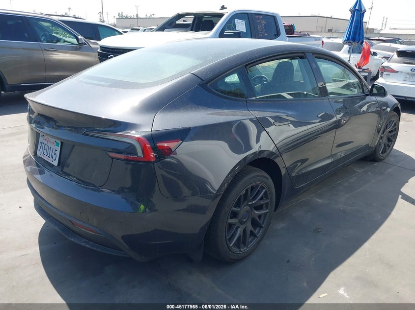 2025 Tesla Model 3 VIN 5YJ3E1EA9SF998711 IAAI salvage auction — SIDE, Salvage Title, sold $11,900 on 2026-07-22 (photo 4)