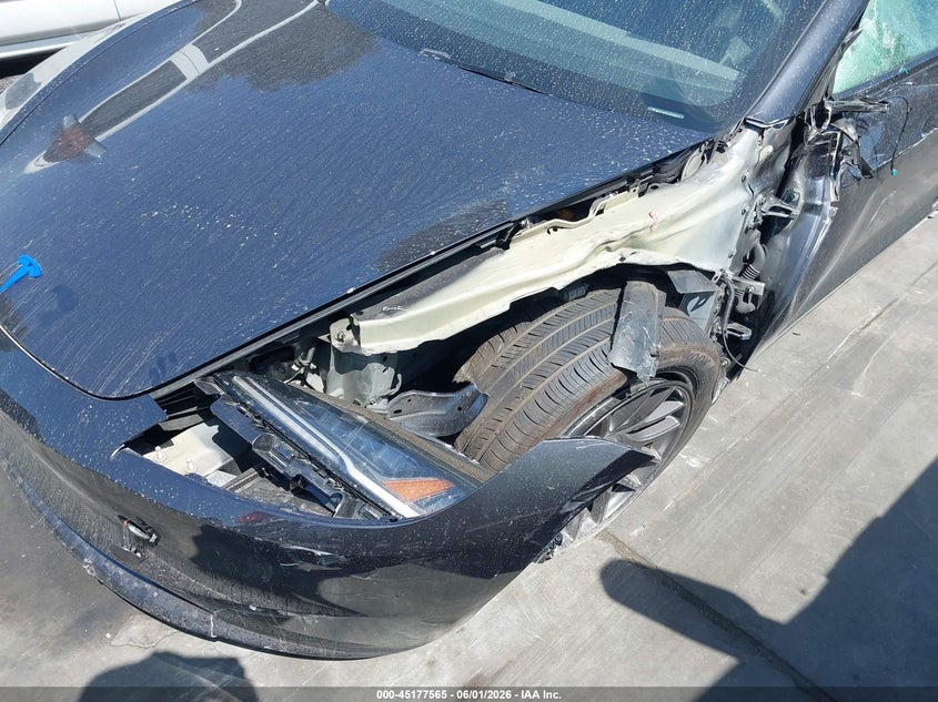 2025 Tesla Model 3 VIN 5YJ3E1EA9SF998711 IAAI salvage auction — SIDE, Salvage Title, sold $11,900 on 2026-07-22 (photo 6)
