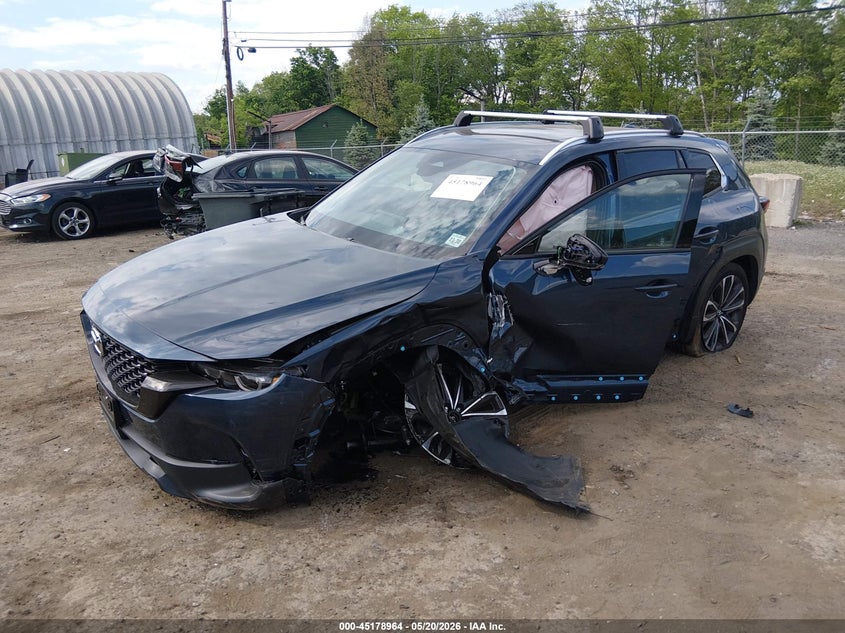 2025 Mazda Cx-50 VIN 7MMVABEM5SN385717 IAAI salvage auction — LEFT SIDE, Salvage (Idaho), sold $6,350 on 2026-07-23 (photo 2)
