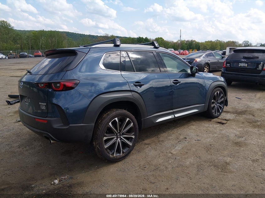 2025 Mazda Cx-50 VIN 7MMVABEM5SN385717 IAAI salvage auction — LEFT SIDE, Salvage (Idaho), sold $6,350 on 2026-07-23 (photo 4)