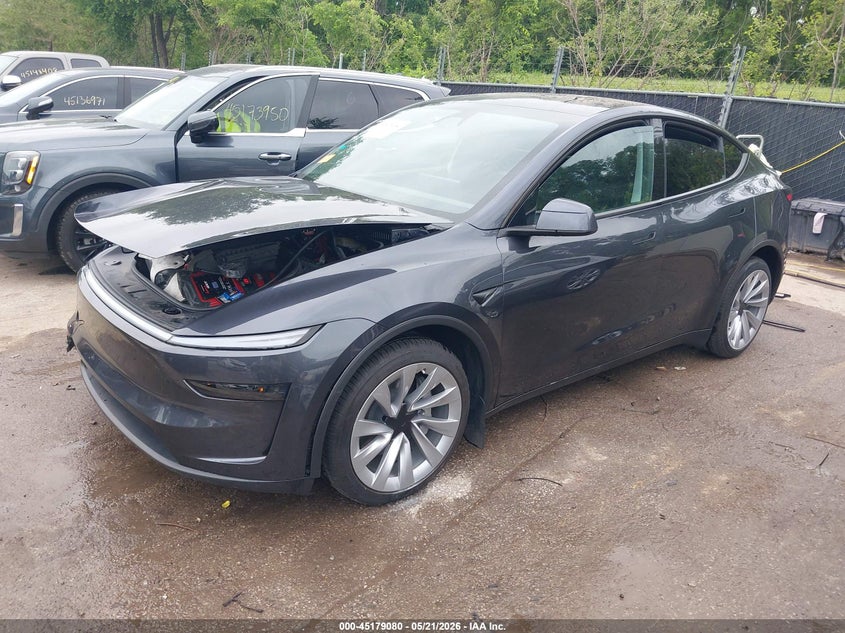 2026 Tesla Model y VIN 7SAYGDEE9TA390998 IAAI salvage auction — FRONT END, Salvage (Kansas), sold $24,200 on 2026-07-22 (photo 2)