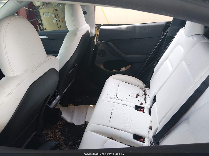 2024 Tesla Model y VIN 7SAYGDEF4RF029389 IAAI salvage auction — WATER/FLOOD, Rebuildable (Florida), sold $4,650 on 2026-07-28 (photo 8)