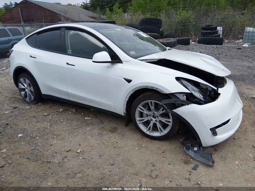 2023 Tesla Model y VIN 7SAYGDEE3PA057122 IAAI salvage auction — FRONT END, Salvage (Massachusetts), sold $9,850 on 2026-07-09 (photo 1)