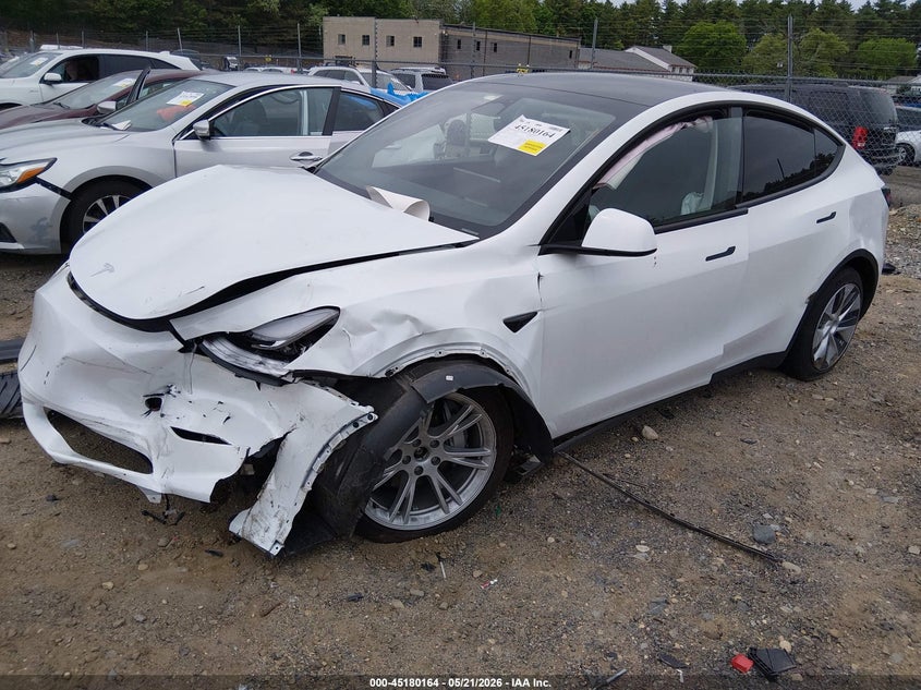 2023 Tesla Model y VIN 7SAYGDEE3PA057122 IAAI salvage auction — FRONT END, Salvage (Massachusetts), sold $9,850 on 2026-07-09 (photo 2)