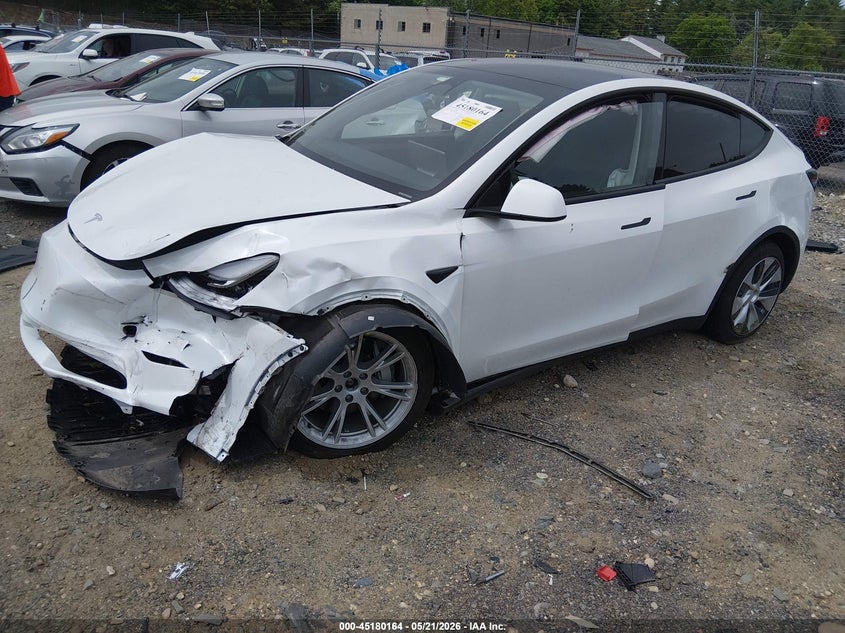 2023 Tesla Model y VIN 7SAYGDEE3PA057122 IAAI salvage auction — FRONT END, Salvage (Massachusetts), sold $9,850 on 2026-07-09 (photo 4)