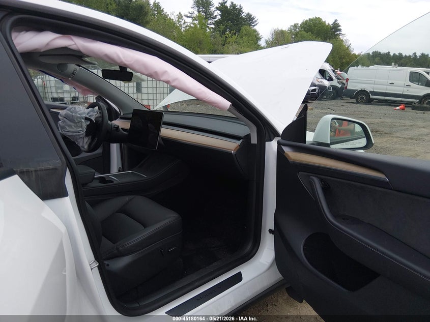 2023 Tesla Model y VIN 7SAYGDEE3PA057122 IAAI salvage auction — FRONT END, Salvage (Massachusetts), sold $9,850 on 2026-07-09 (photo 5)