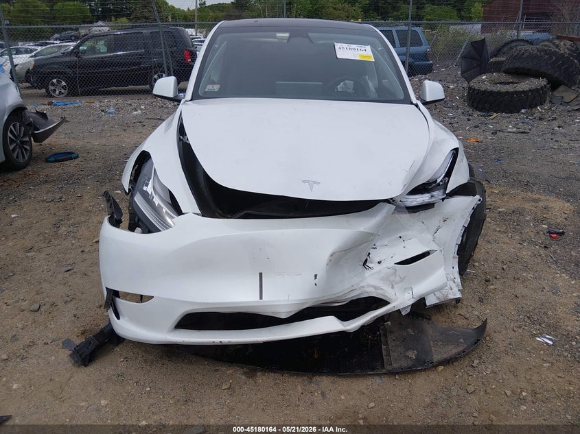2023 Tesla Model y VIN 7SAYGDEE3PA057122 IAAI salvage auction — FRONT END, Salvage (Massachusetts), sold $9,850 on 2026-07-09 (photo 6)