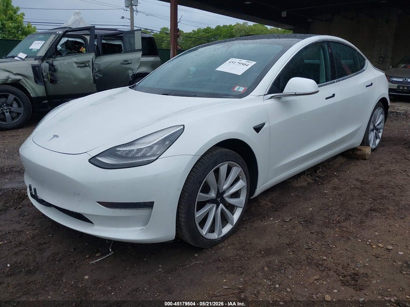 2020 Tesla Model 3 VIN 5YJ3E1EB8LF667550 IAAI salvage auction — REAR END, Mv-907A (New York), sold $7,200 on 2026-07-23 (photo 2)