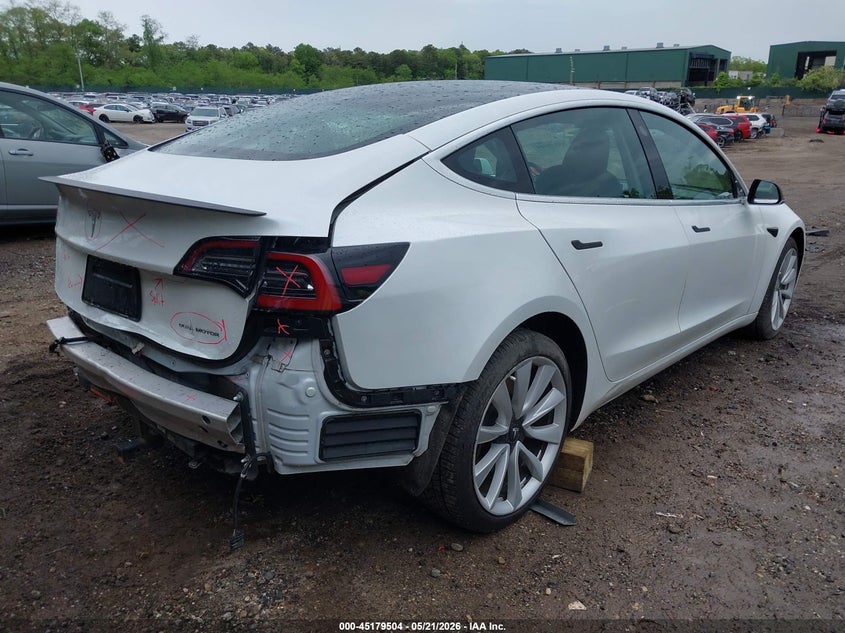 2020 Tesla Model 3 VIN 5YJ3E1EB8LF667550 IAAI salvage auction — REAR END, Mv-907A (New York), sold $7,200 on 2026-07-23 (photo 4)