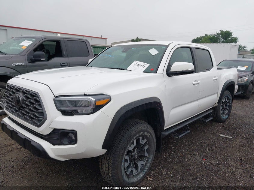 2021 Toyota Tacoma VIN 3TMCZ5ANXMM444337 IAAI salvage auction — SIDE, Salvage (Oklahoma), sold $17,000 on 2026-07-31 (photo 2)