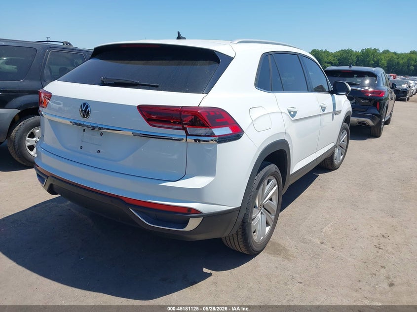 2021 Volkswagen Atlas cross sport VIN 1V2JC2CAXMC211950 IAAI salvage auction — HAIL, Salvage Title, sold $7,325 on 2026-07-21 (photo 4)