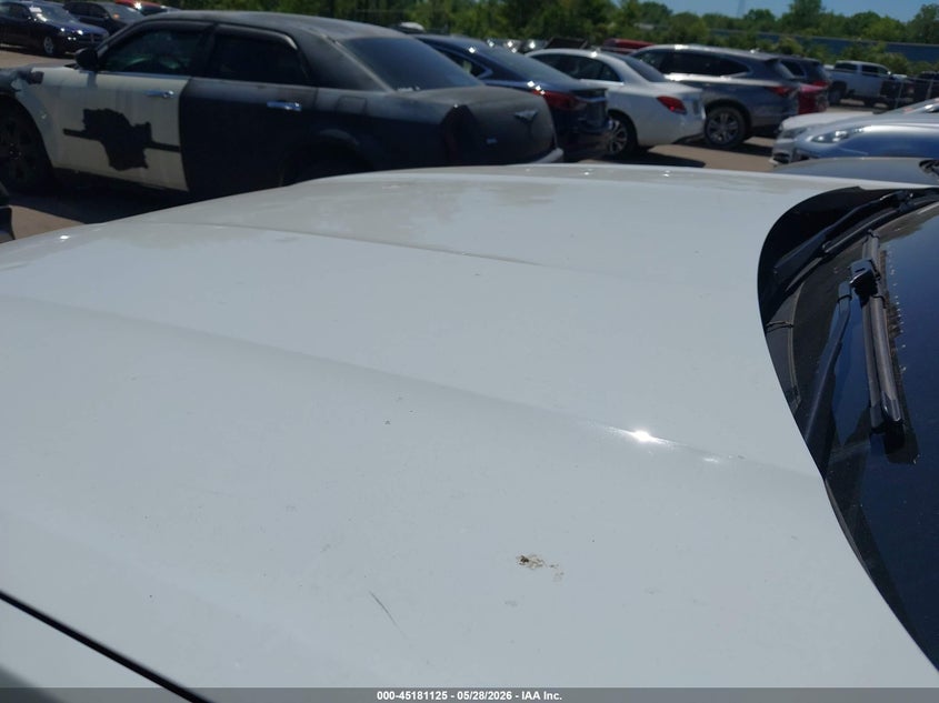 2021 Volkswagen Atlas cross sport VIN 1V2JC2CAXMC211950 IAAI salvage auction — HAIL, Salvage Title, sold $7,325 on 2026-07-21 (photo 6)