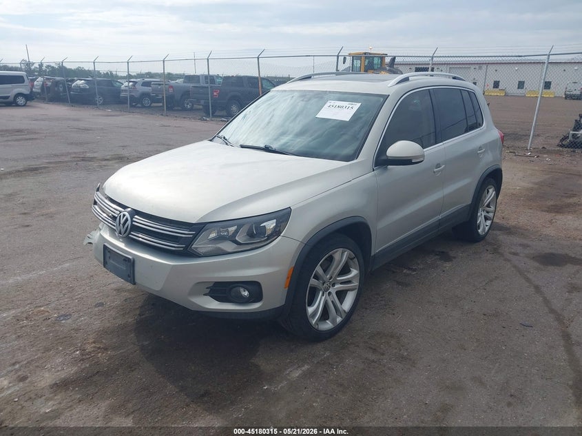 2012 Volkswagen Tiguan VIN WVGBV7AXXCW607373 IAAI salvage auction — RIGHT FRONT, Regular (South Dakota), sold $1,500 on 2026-07-07 (photo 2)