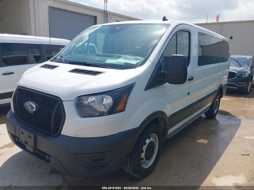 2021 Ford Transit 150 VIN 1FMZK1Y80MKA91732 IAAI salvage auction — SIDE, Sf97 (Texas), sold $20,100 on 2026-07-07 (photo 2)