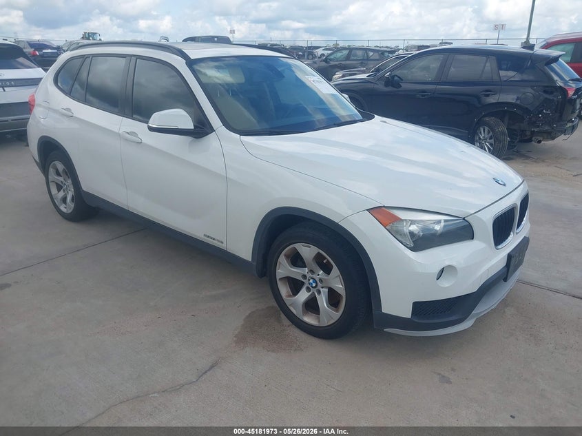 2015 BMW X1 VIN WBAVM1C58FV315919 IAAI salvage auction — LEFT SIDE, Original (Texas), sold $1,650 on 2026-07-31 (photo 1)