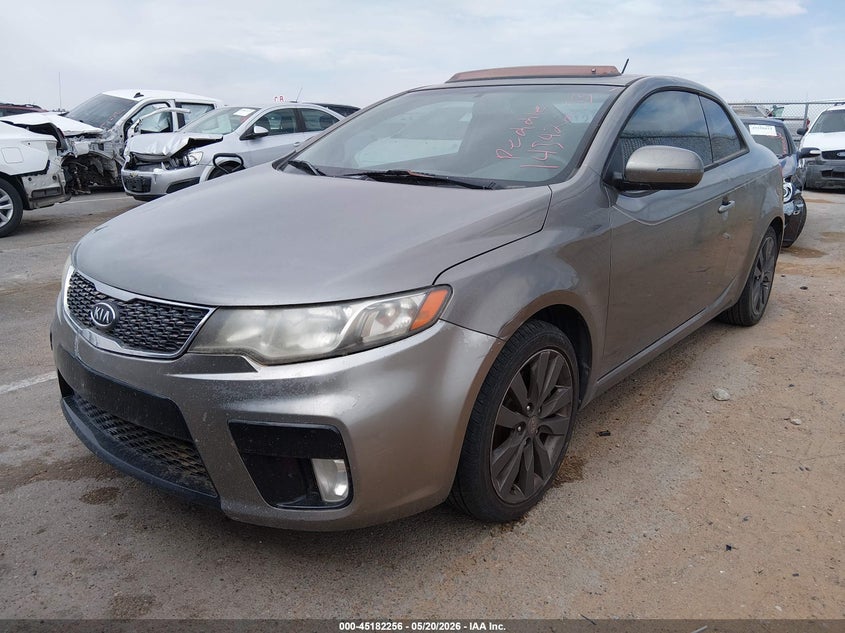 2012 Kia Forte VIN KNAFW6A31C5593229 IAAI salvage auction — NORMAL WEAR, Clear (Florida), sold $350 on 2026-07-15 (photo 2)