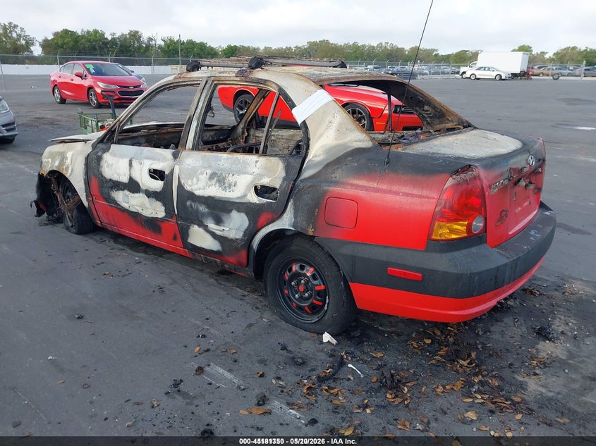 2003 Hyundai Accent VIN KMHCG45C63U424620 IAAI salvage auction — BURN, Salvage (Idaho), sold $25 on 2026-07-06 (photo 3)