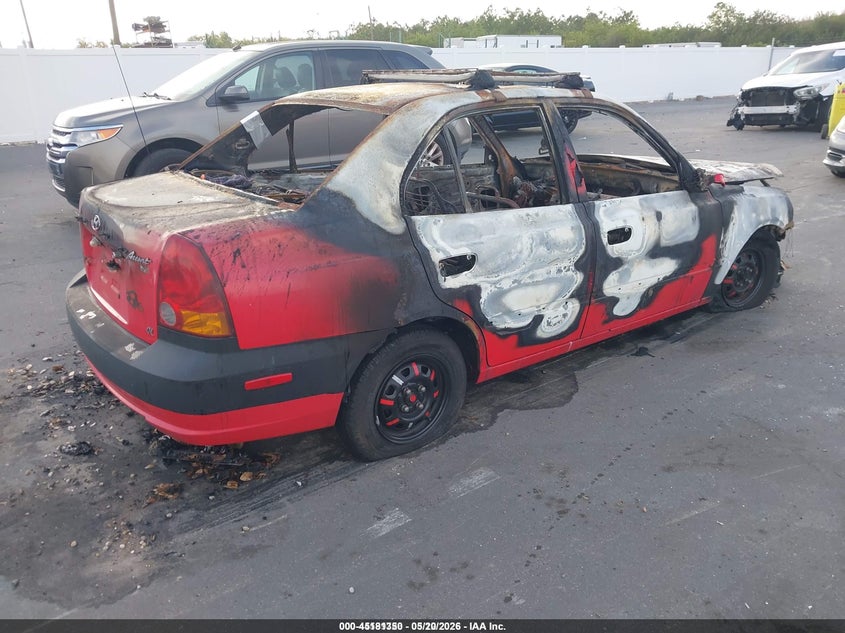 2003 Hyundai Accent VIN KMHCG45C63U424620 IAAI salvage auction — BURN, Salvage (Idaho), sold $25 on 2026-07-06 (photo 4)