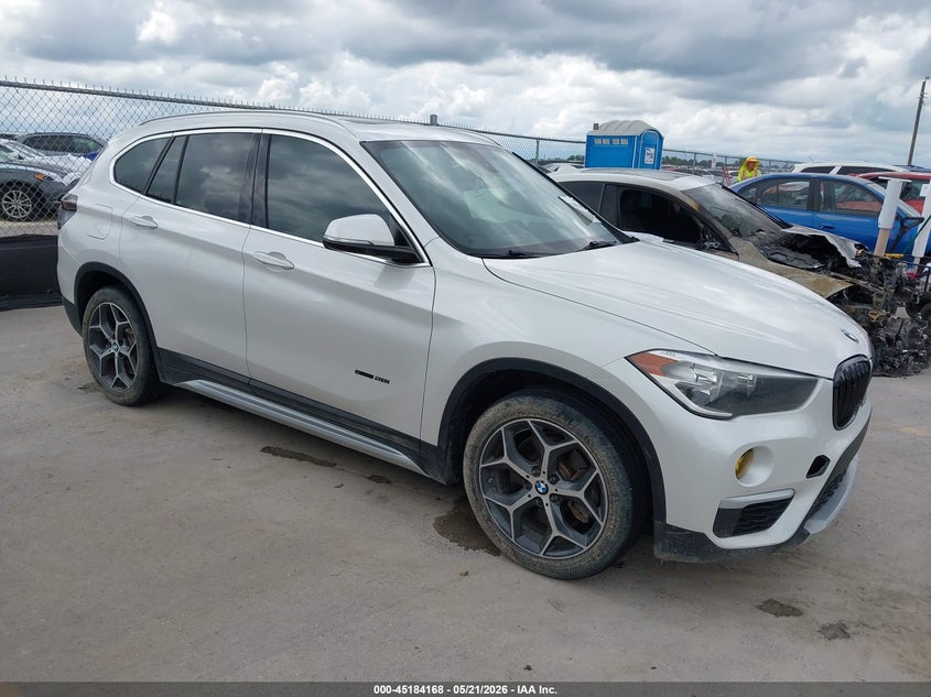 2018 BMW X1 VIN WBXHU7C32J5H42593 IAAI salvage auction — LEFT FRONT, Salvage (Texas), sold $4,250 on 2026-07-09 (photo 1)