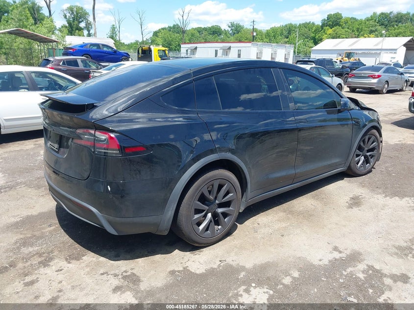 2023 Tesla Model x VIN 7SAXCBE57PF373038 IAAI salvage auction — LEFT FRONT, Salvage - 75% Or Less (Maryland), sold $13,400 on 2026-08-02 (photo 4)
