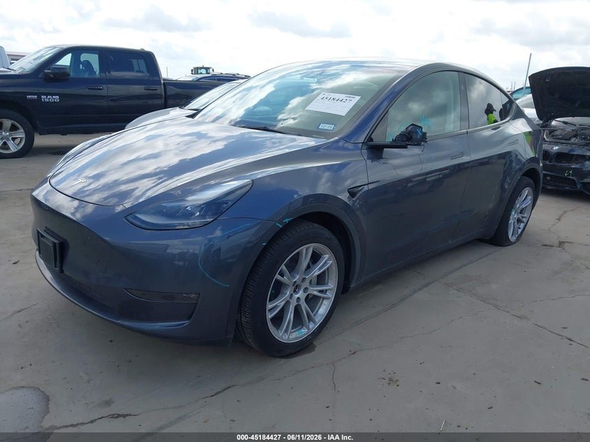 2023 Tesla Model y VIN 7SAYGDEE3PA175915 IAAI salvage auction — SIDE, Original (Texas), sold $16,450 on 2026-07-16 (photo 2)
