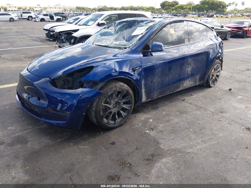 2025 Tesla Model y VIN 7SAYGDEE1SA338814 IAAI salvage auction — BIO HAZARD, Certificate Of Destruction (Florida), sold $125 on 2026-07-23 (photo 2)