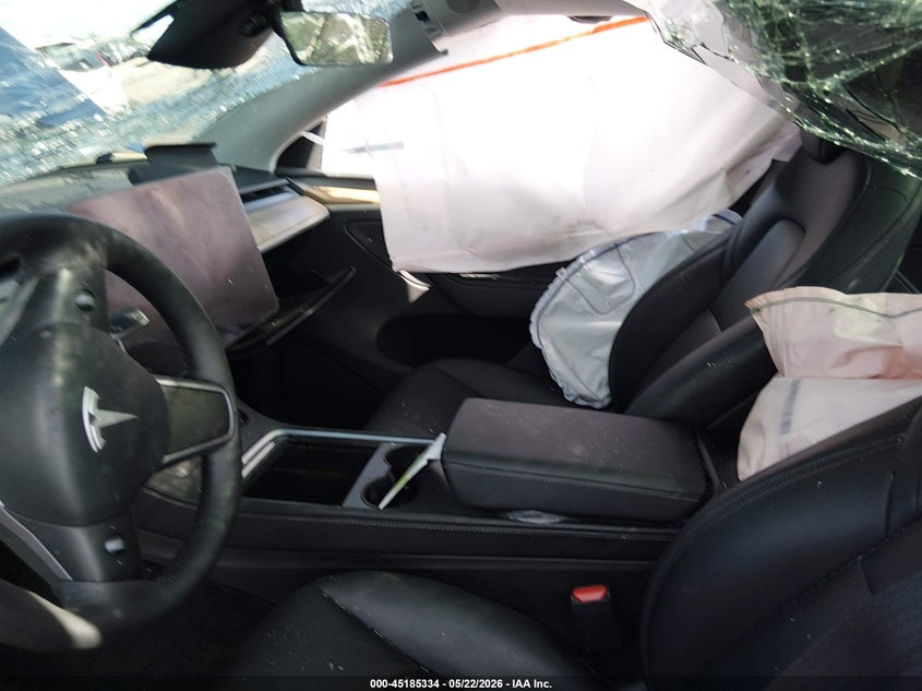 2025 Tesla Model y VIN 7SAYGDEE1SA338814 IAAI salvage auction — BIO HAZARD, Certificate Of Destruction (Florida), sold $125 on 2026-07-23 (photo 5)