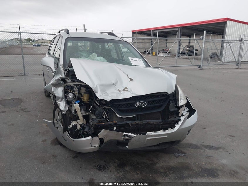 2009 Kia Rondo VIN KNAFG528897273176 IAAI salvage auction — FRONT & REAR, Certificate Of Title (Nebraska), sold $525 on 2026-07-09 (photo 6)