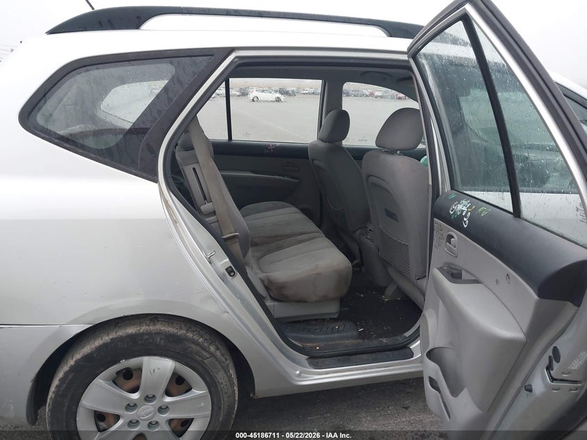 2009 Kia Rondo VIN KNAFG528897273176 IAAI salvage auction — FRONT & REAR, Certificate Of Title (Nebraska), sold $525 on 2026-07-09 (photo 8)