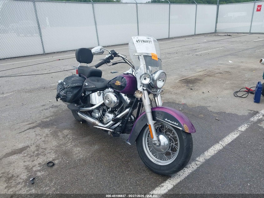 2011 Harley-davidson Flstc VIN 1HD1BW514BB024732 — IAAI salvage auction photo