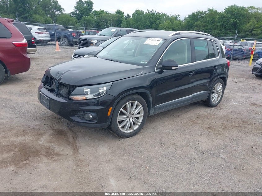 2013 Volkswagen Tiguan VIN WVGBV7AX2DW510928 IAAI salvage auction — FRONT END, Prior Salvage (Minnesota), sold $500 on 2026-07-20 (photo 2)
