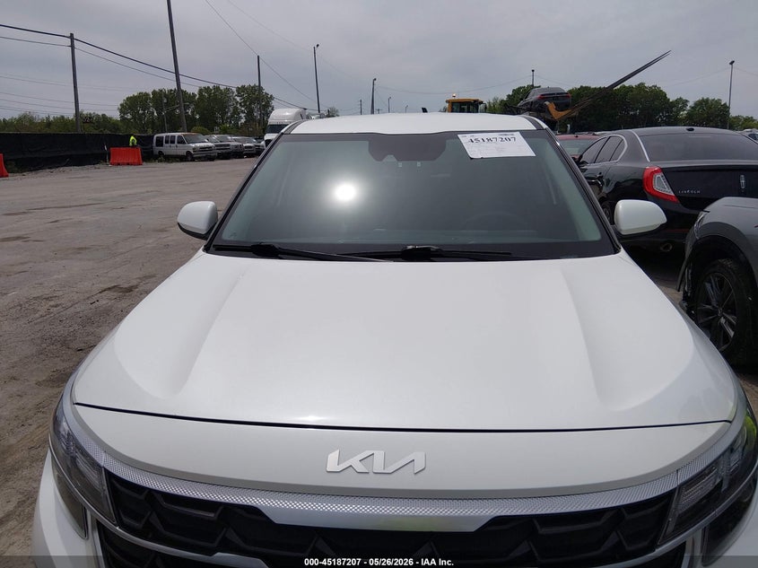 2024 Kia Seltos VIN KNDEPCAA2R7556406 IAAI salvage auction — HAIL, Salvage Title, sold $11,775 on 2026-07-14 (photo 6)