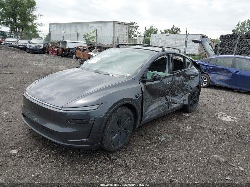 2026 Tesla Model y VIN 7SAYGDEE1TA384872 IAAI salvage auction — LEFT SIDE, Salvage (Pennsylvania), sold $13,000 on 2026-07-30 (photo 2)