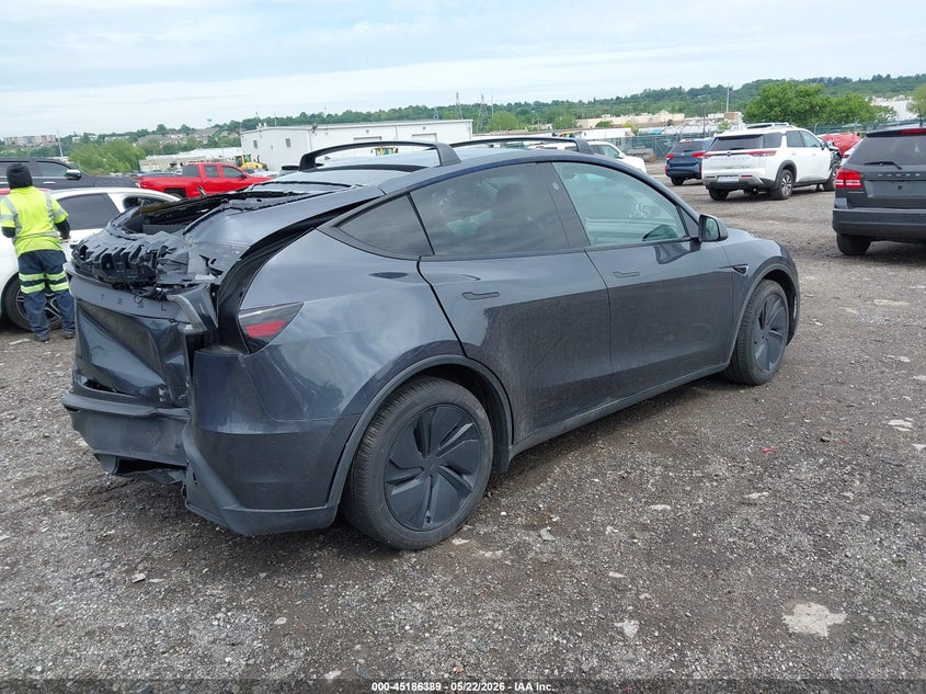 2026 Tesla Model y VIN 7SAYGDEE1TA384872 IAAI salvage auction — LEFT SIDE, Salvage (Pennsylvania), sold $13,000 on 2026-07-30 (photo 4)