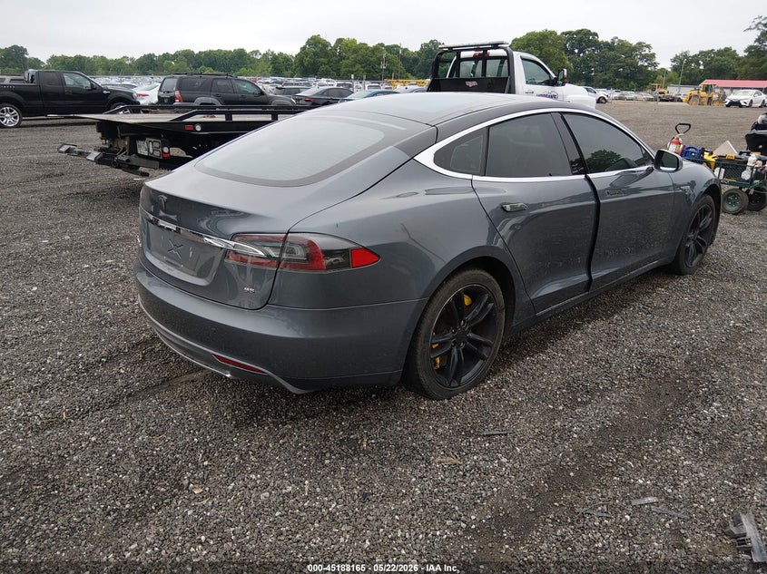 2013 Tesla Model s VIN 5YJSA1CNXDFP16396 IAAI salvage auction — INTERIOR BURN, Salvage (South Carolina), sold $550 on 2026-07-09 (photo 4)