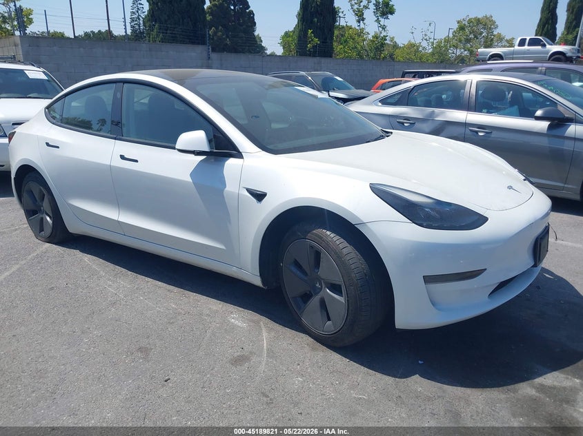 2023 Tesla Model 3 VIN 5YJ3E1EA6PF610132 IAAI salvage auction — SIDE, Salvage (California), sold $8,500 on 2026-07-16 (photo 1)