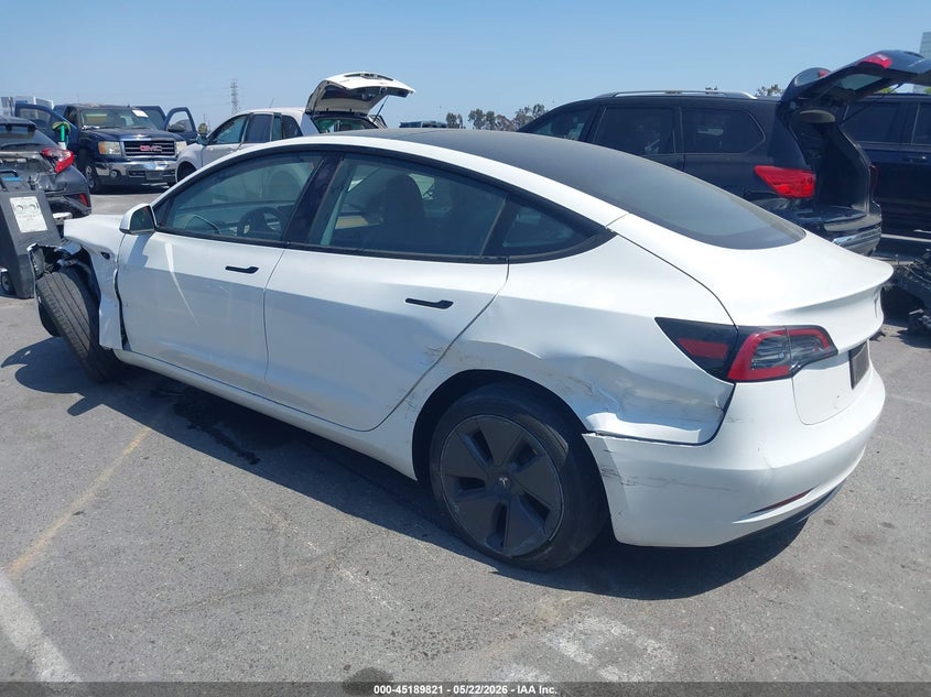 2023 Tesla Model 3 VIN 5YJ3E1EA6PF610132 IAAI salvage auction — SIDE, Salvage (California), sold $8,500 on 2026-07-16 (photo 3)