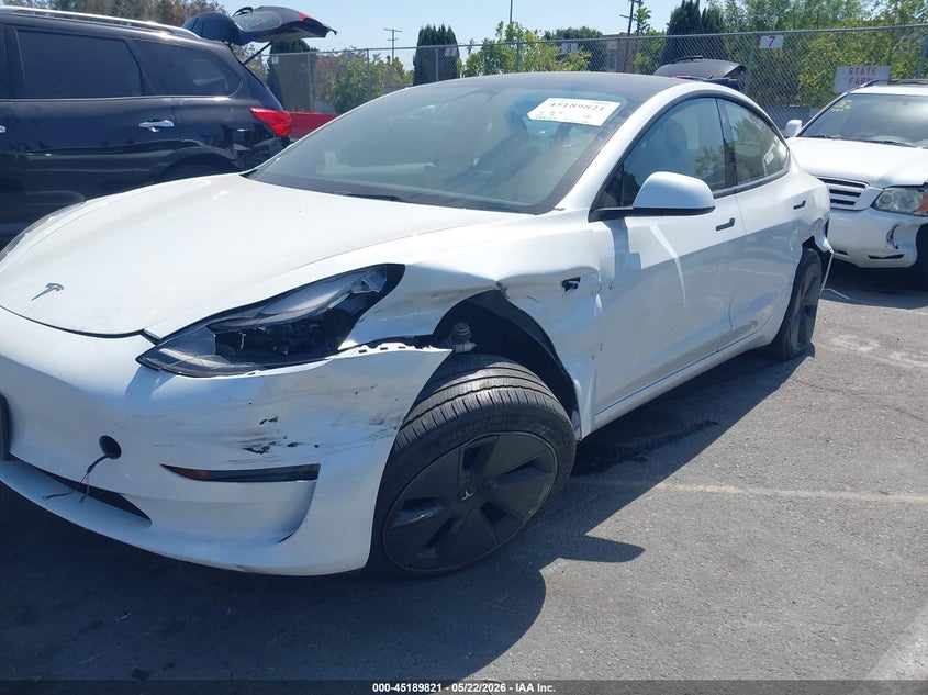 2023 Tesla Model 3 VIN 5YJ3E1EA6PF610132 IAAI salvage auction — SIDE, Salvage (California), sold $8,500 on 2026-07-16 (photo 6)