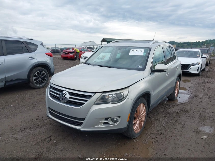 2011 Volkswagen Tiguan VIN WVGBV7AX8BW566353 IAAI salvage auction — NORMAL WEAR, Clear (Texas), sold $500 on 2026-07-14 (photo 2)