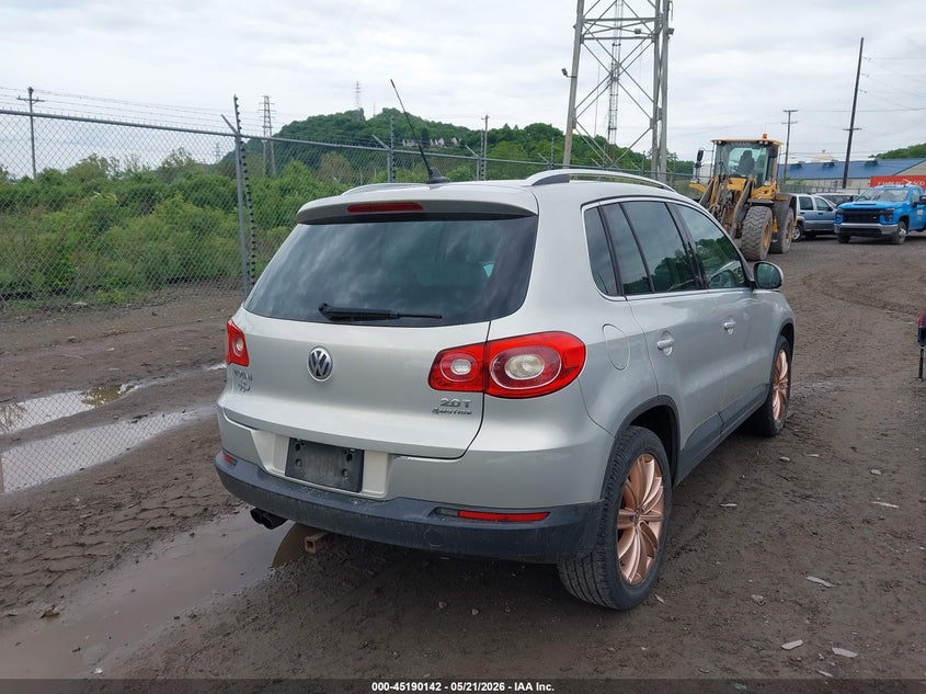 2011 Volkswagen Tiguan VIN WVGBV7AX8BW566353 IAAI salvage auction — NORMAL WEAR, Clear (Texas), sold $500 on 2026-07-14 (photo 4)