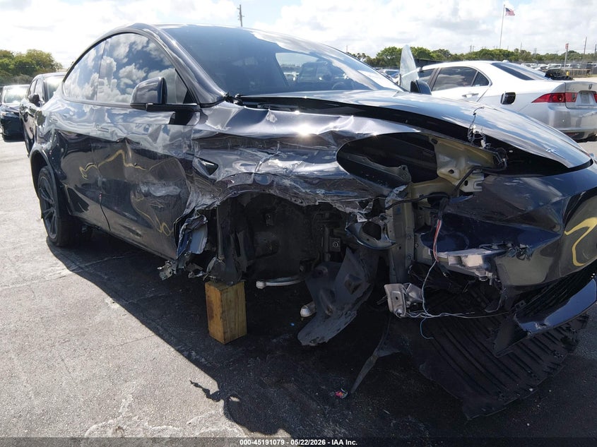 2024 Tesla Model y VIN 7SAYGDEE4RA302562 IAAI salvage auction — RIGHT SIDE, Rebuildable (Florida), sold $7,775 on 2026-07-30 (photo 6)
