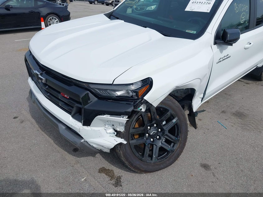 2025 Chevrolet Colorado VIN 1GCPTDEK9S1208642 IAAI salvage auction — LEFT FRONT, Salvage (Indiana), sold $15,600 on 2026-07-09 (photo 6)